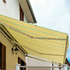 Tende da sole a bracci senza cassonetto per case e negozi